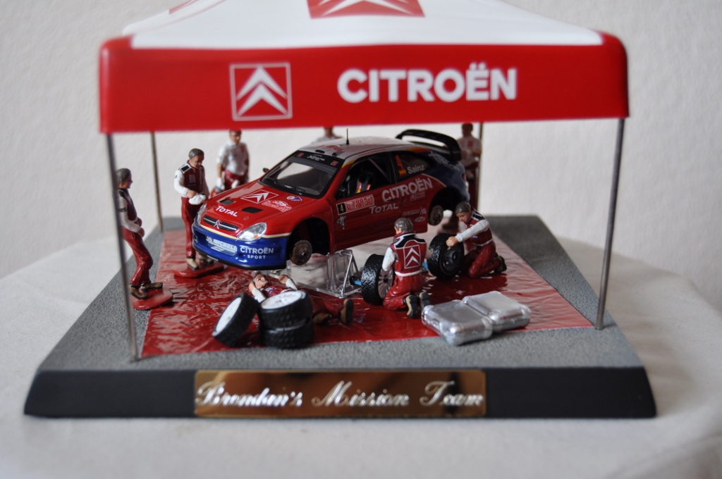 Citroen Pit Stop humorous toy presented to Rev Brendan 