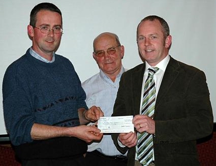 Rev Geoff Wilson with cheque for €4000