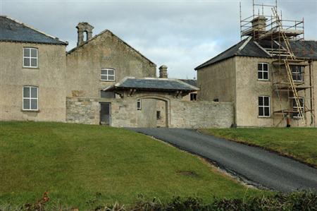 Workhouse showing lych gate