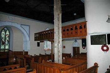 wooden tower temporarily holding up the roof