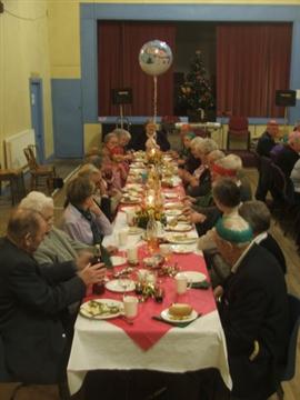 At the dinner table at last year's party